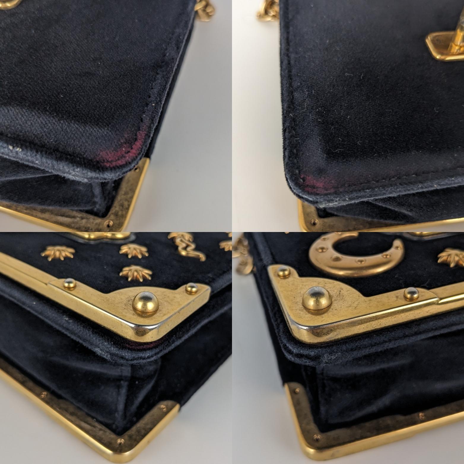Condition: This authentic Prada bag is in overall good pre-loved condition. There are scratches and fading on the hardware, light edge wear on velvet and red discoloration under flap. Scratches on interior leather.

No accessories included (dust