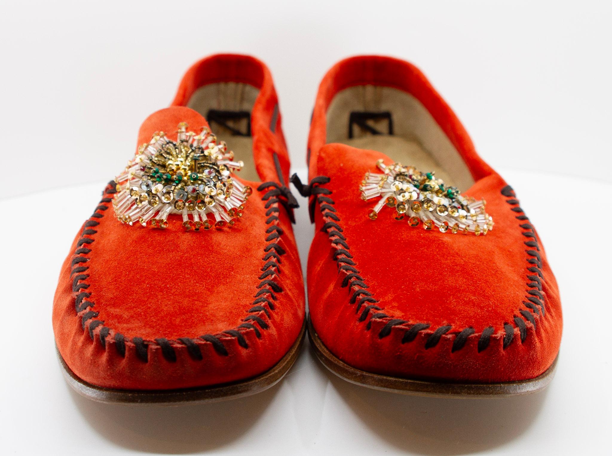 PRADA, vermilion, suede, loafers with beaded embellishments and leather soles, Estate of André Leon Talley.

New condition.

Given to André Leon Talley by Prada, never worn.

Size 14