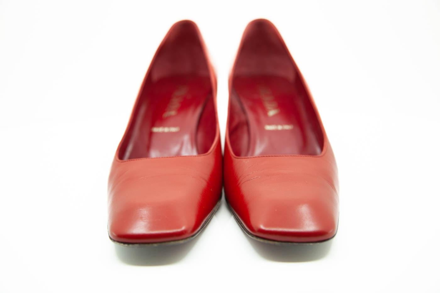 Prada red leather square toe and block style heels. Very Vintage. Original box and dust bag.
size U.S 10