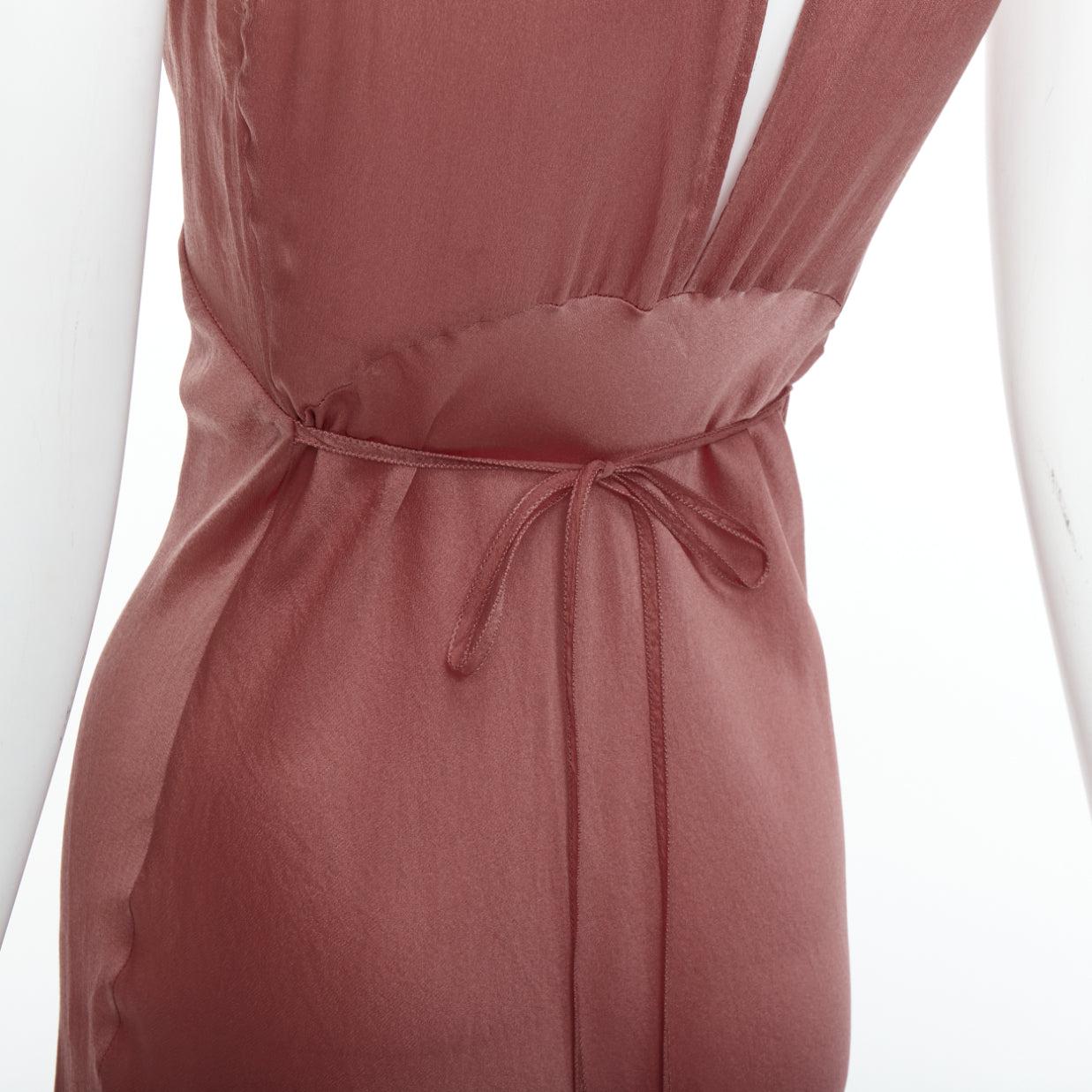 PRADA Vintage 100% silk blush pink beaded trim V neck slip dress IT42 M
Reference: CNLE/A00319
Brand: Prada
Designer: Miuccia Prada
Material: Silk
Color: Pink
Pattern: Solid
Closure: Slip On
Extra Details: Slip on and back tie.
Made in: