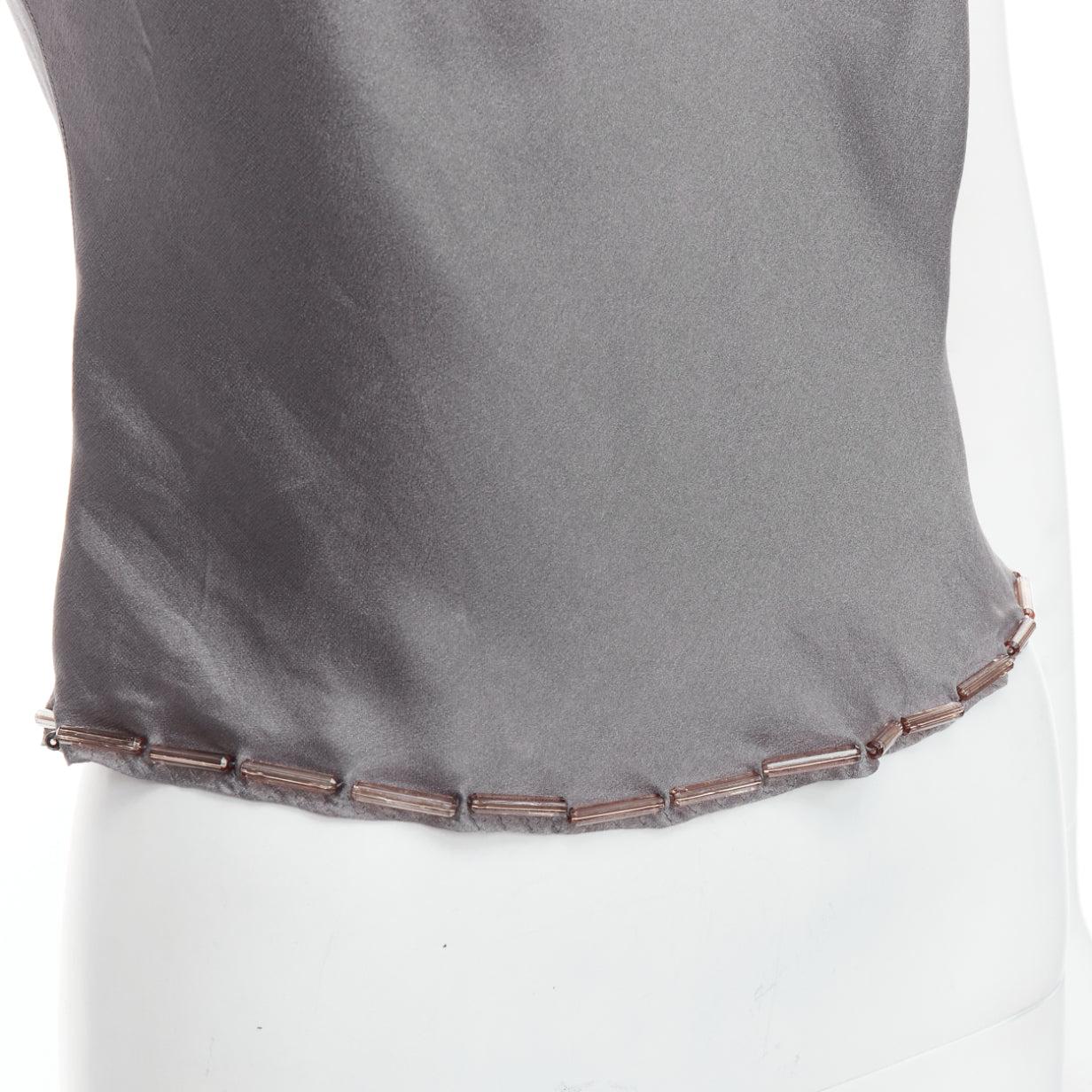 PRADA Vintage 100% silk grey clear long bead embellished camisole top IT38 XS
Reference: TGAS/E00294
Brand: Prada
Designer: Miuccia Prada
Material: Silk
Color: Grey
Pattern: Solid
Closure: Slip On
Lining: Grey Silk
Made in:
