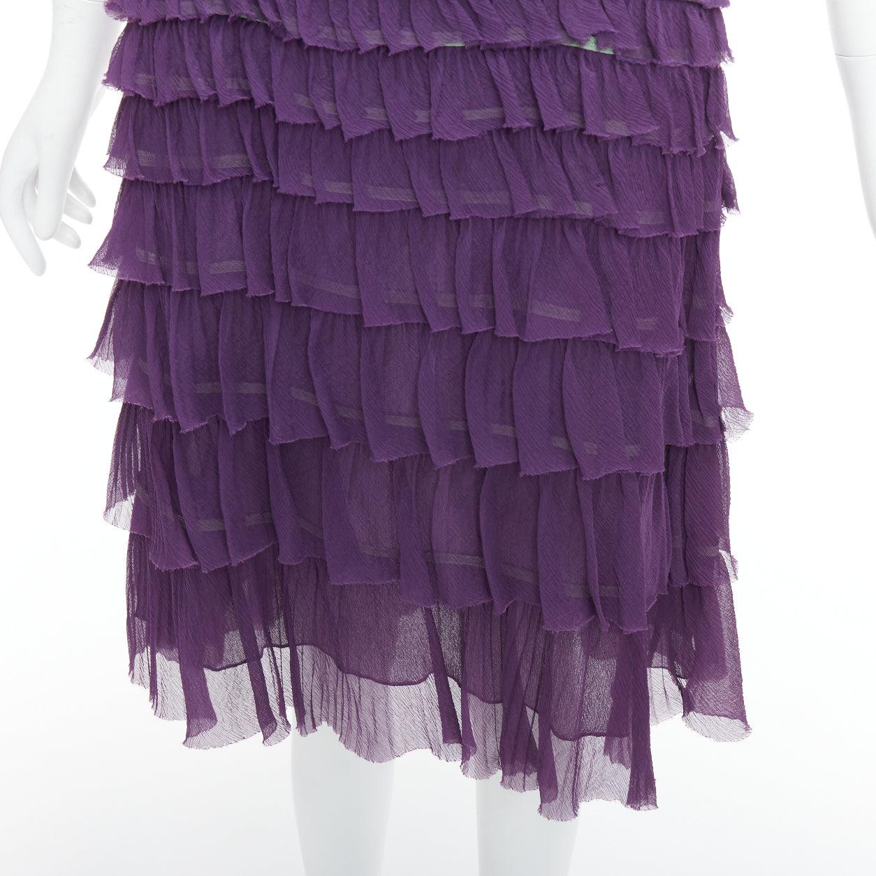 PRADA Vintage 100% silk purple green trim pleated tiered dress IT38 XS
Reference: MECG/A00032
Brand: Prada
Designer: Miuccia Prada
Material: Silk
Color: Purple, Green
Pattern: Solid
Closure: Zip
Lining: Purple Silk
Extra Details: Lined with silk in