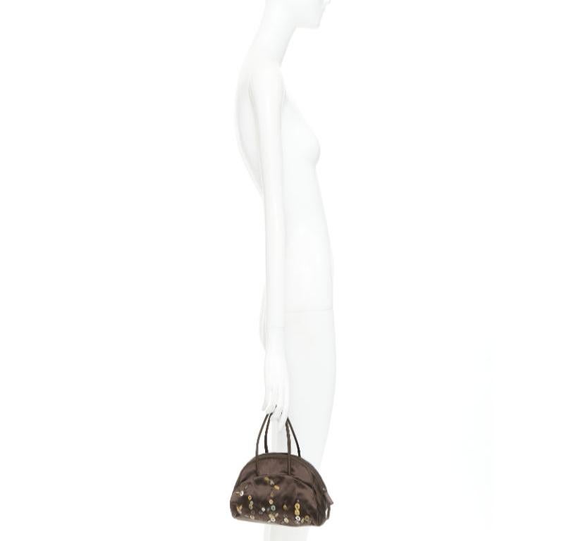 PRADA Vintage brown satin leather beads embroidered top handle bag
Reference: TGAS/F00413
Brand: Prada
Designer: Miuccia Prada
Material: Satin
Color: Brown, Multicolour
Pattern: Solid
Closure: Zip
Lining: Brown Satin
Extra Details: Prada Evening