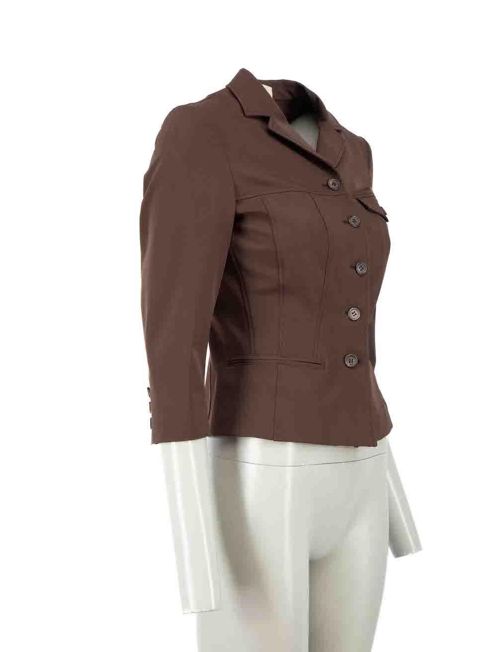 CONDITION is Very good. Minimal wear to jacket is evident. Minimal wear to button attachment with some loose threads at centre front on this used Prada designer resale item.
 
Details
Vintage
Brown
Polyester
Utility jacket
Button up fastening
3x