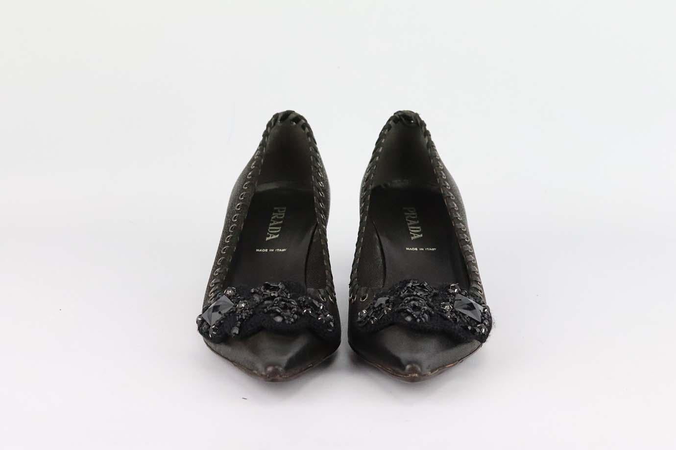 These vintage pumps by Prada are dotted with crystals along the sweetheart vamp, this point-toe pair has been made in Italy from textured black leather, they're set on comfortable 38mm heels. Heel measures approximately 38 mm/ 1.5 inches. Black