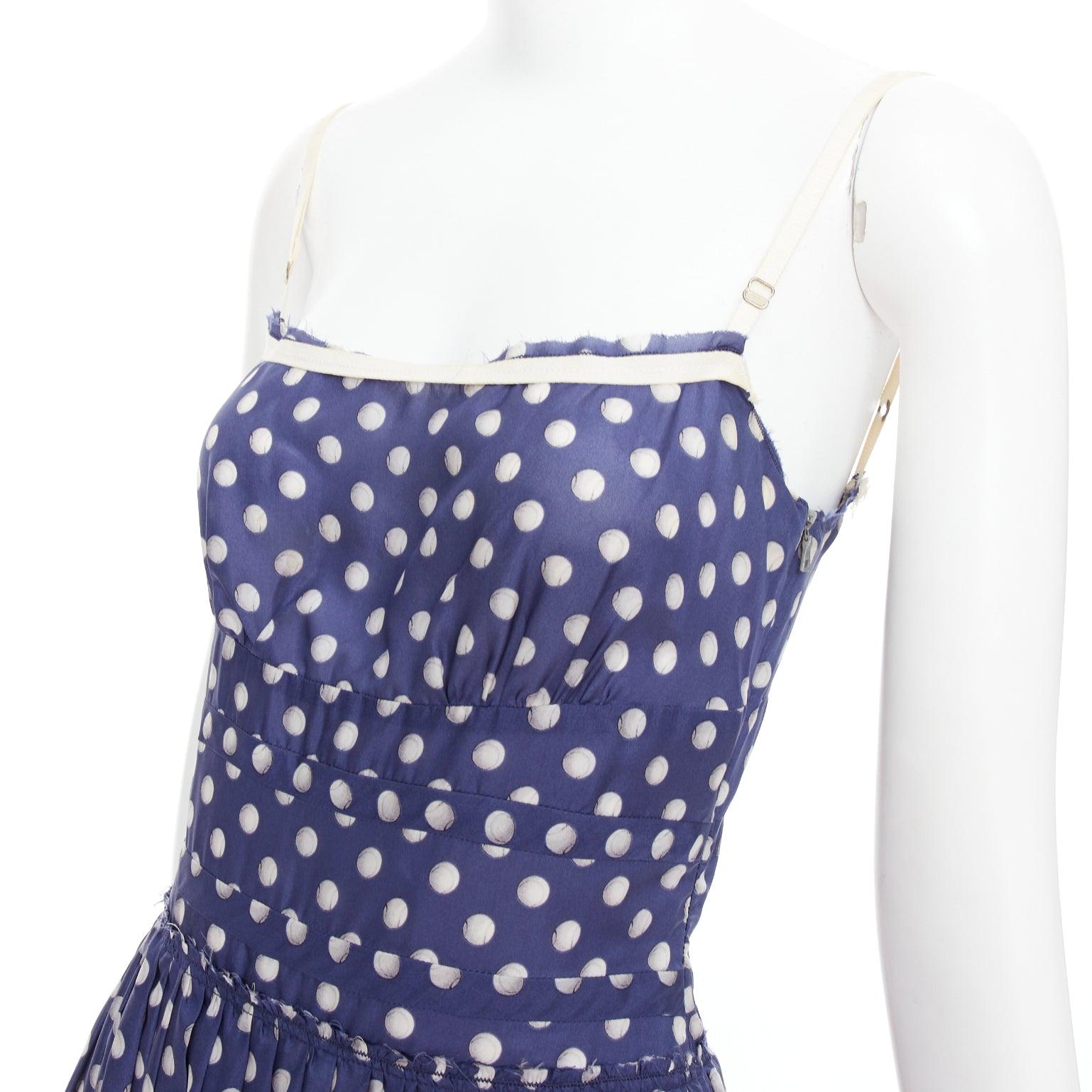 PRADA Vintage Linea Rossa blue white polka dot print sun day dress IT38 XS
Reference: VEHO/A00003
Brand: Prada
Designer: Miuccia Prada
Collection: Linea Rossa
Material: Fabric
Color: Navy, White
Pattern: Polka Dot
Closure: Zip
Extra Details: Side