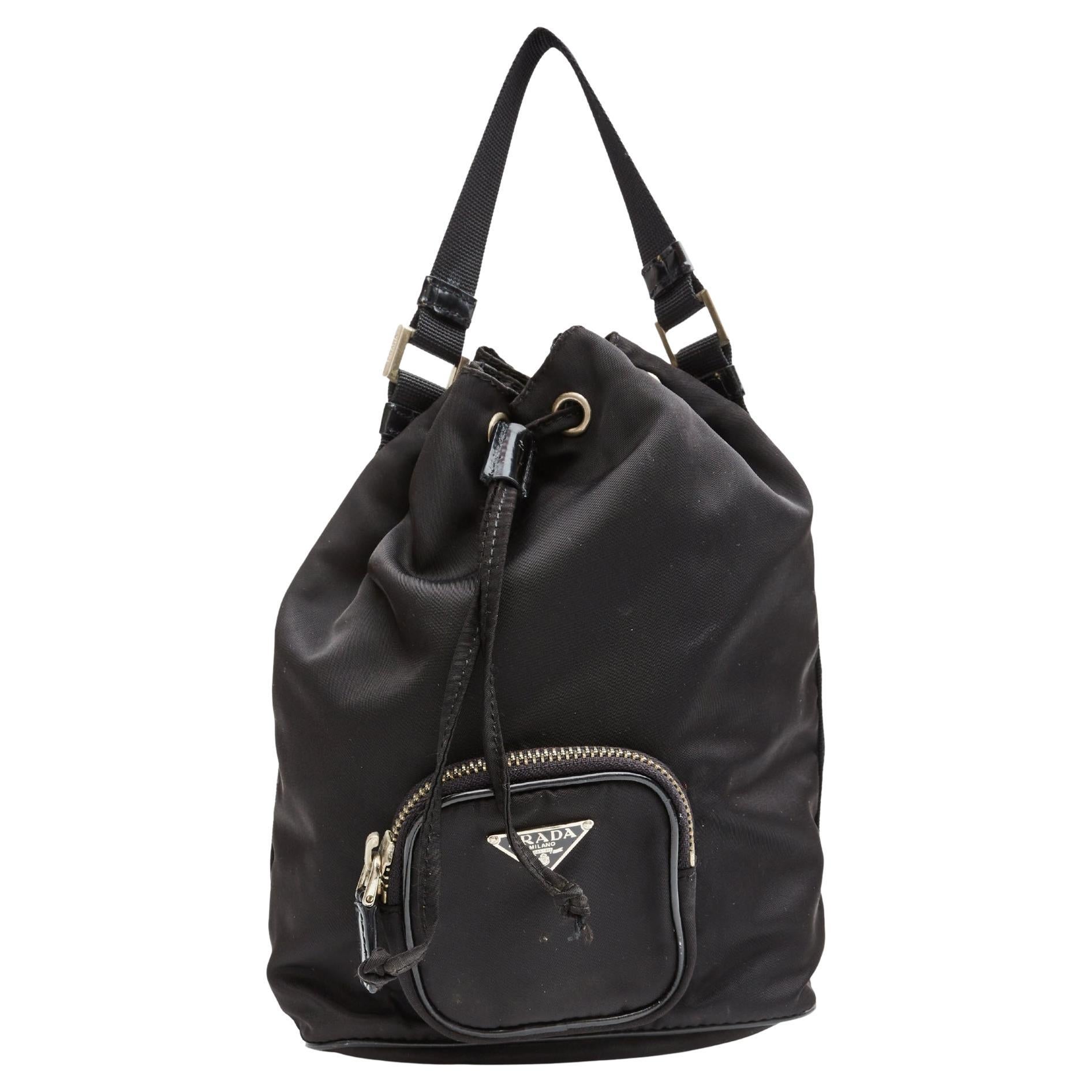 Prada - Nylon Studded Bucket Bag | HBX - Globally Curated Fashion and  Lifestyle by Hypebeast