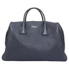 PRADA Vitello Daino metal logo black pebbled calfskin travel weekender tote bag