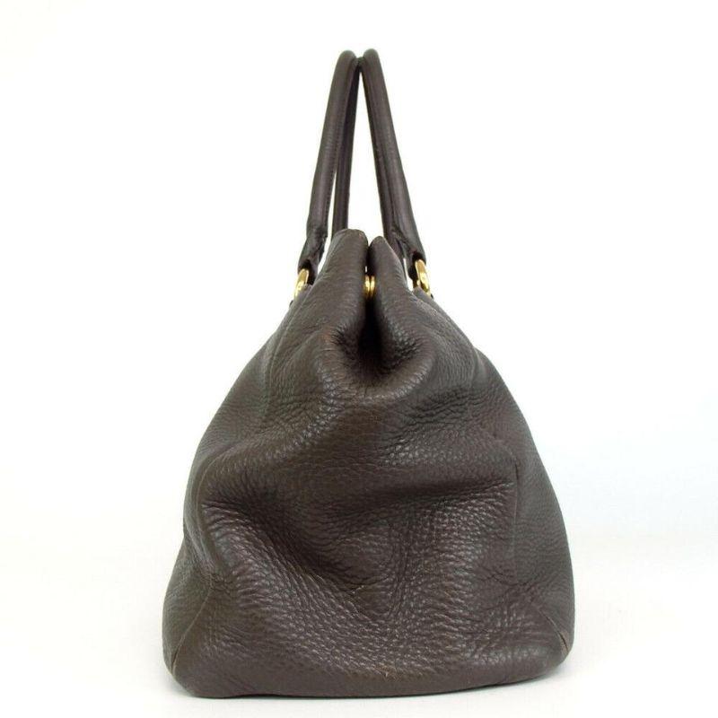 Prada Vitello Large Leather Shoulder Bag GG-0924P-0007

Here is a beautiful Prada elegant soft calf leather shoulder bag with gold hardware signature Prada logo on the front. The ample interior space and two large exterior pockets makes it perfect