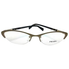 Prada VPR 54P EAG-101 Occhiali da Vista Cat Eye Montature Oro Opaco/Tartaruga