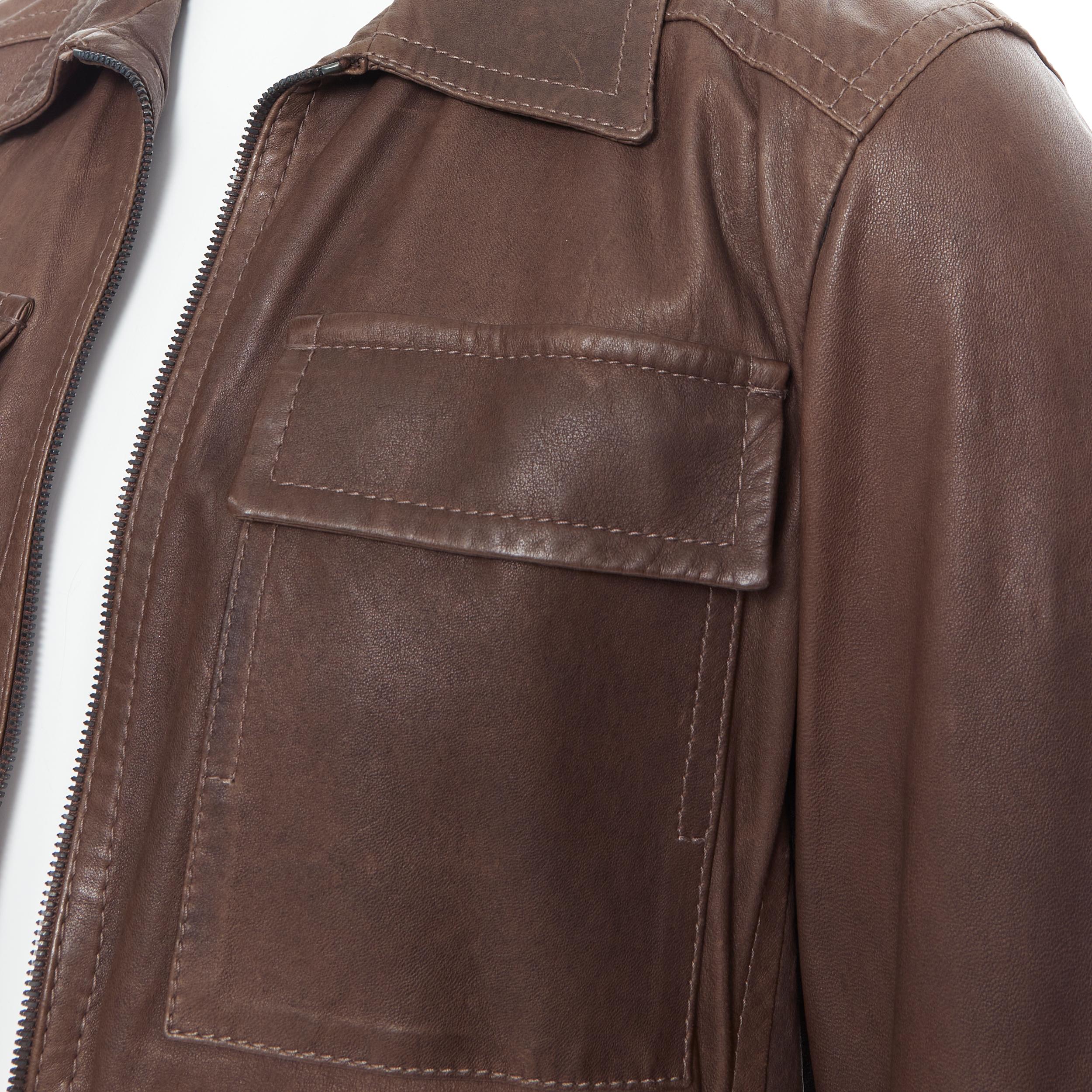 PRADA washed brown leather flap pocket collared zip flight jacket IT46 S Reference: PRCN/A00035 Brand: Prada Material: Leather Color: Brown Pattern: Solid Closure: Zip Extra Detail: Washed leather. Dual flap breast pockets. Dual zip front closure.