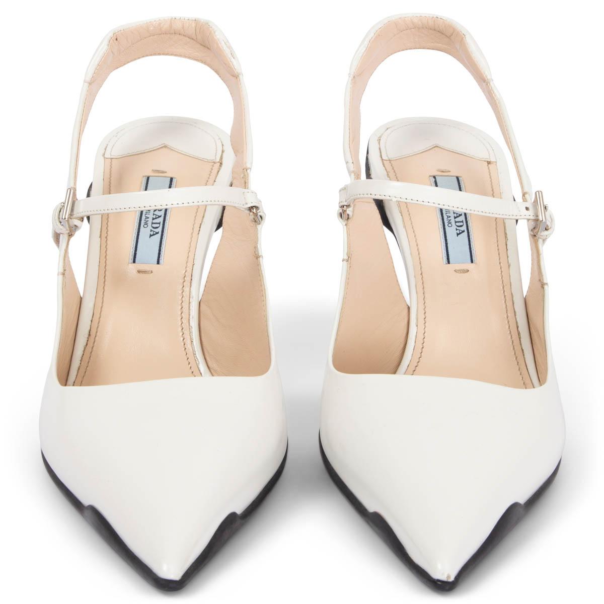 100% authentic Prada pointed-toe slingbacks in white smooth leather featuring instep strap and black rubber sole. Have been worn worn once or twice and are in virtually new condition. Come with dust bag. 

2019 Resort

Measurements
Imprinted