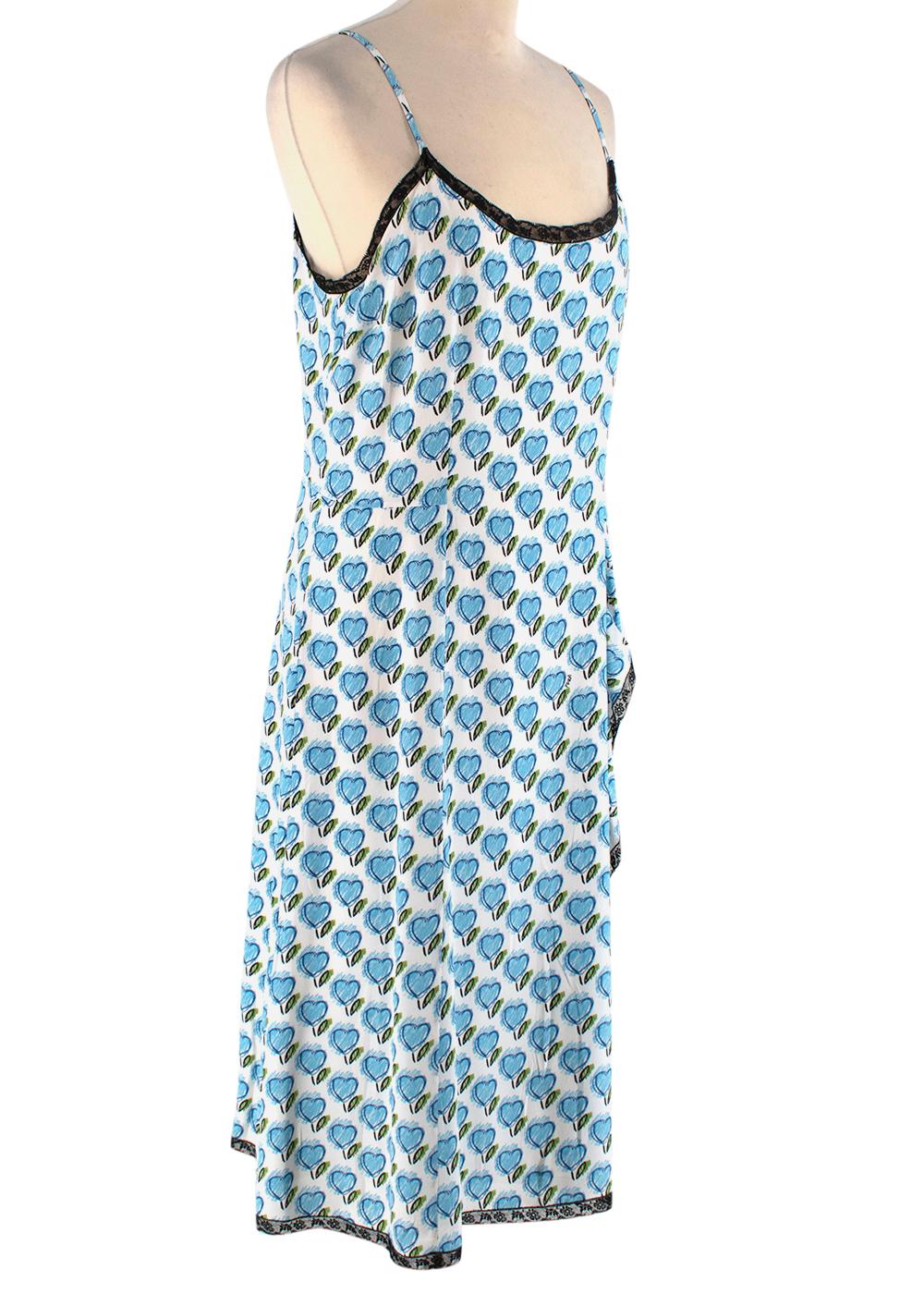 Prada White & Blue Hearts Print Lace Trim Cami Dress

-Black Lace Trim 
-Blue And White Heart Print
-Ruffle From Waist Down 
-Cami Midi Dress
-Thin Straps
-Hidden Side Zip
-White Lining

No Size Label
No Material/Care Label

PLEASE NOTE, THESE ITEMS