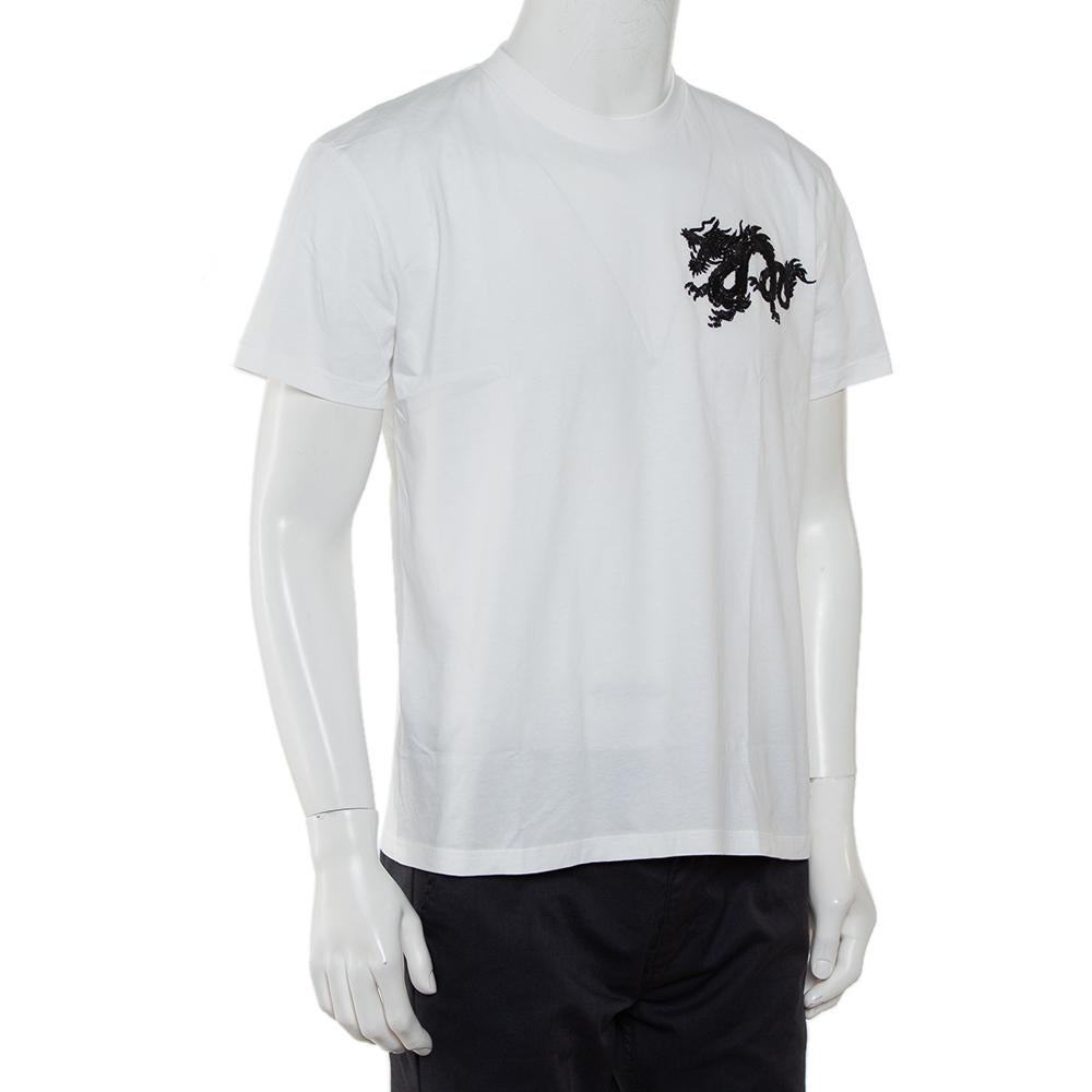 This T-shirt from Prada offers an amazing fit! It is made of 100% cotton and features an embroidered dragon detailed on the front. It comes with a crew neck and short sleeves and will look best with casual jeans and sneakers.

