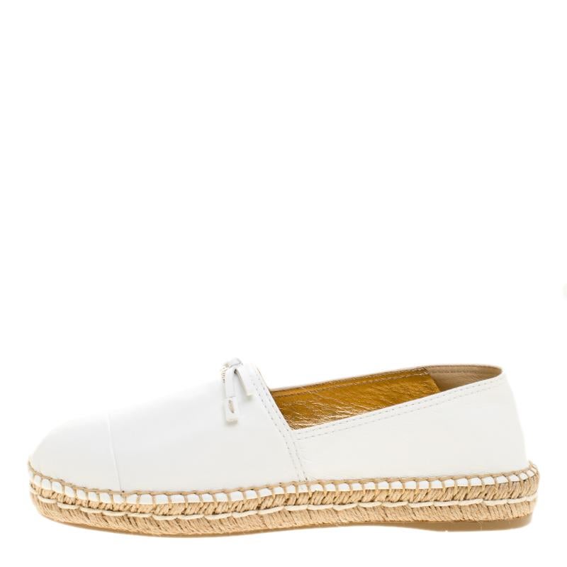 These espadrilles from Prada are a cool twist to flaunt this season. Made from white leather and designed with little bows on the uppers and braided midsoles, these flats are bound to offer comfort and style.

Includes: Original Dustbag


