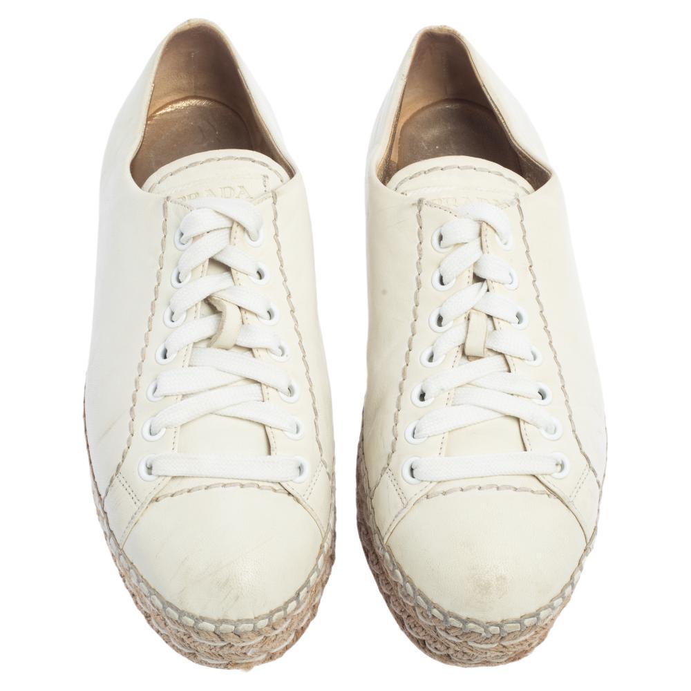 Effortlessly chic and stylish, these sneakers from Prada are what your wardrobe has been missing all this while! The sneakers are well-crafted from white leather and they are secured with lace-ups. Comfortable insoles and espadrille platforms