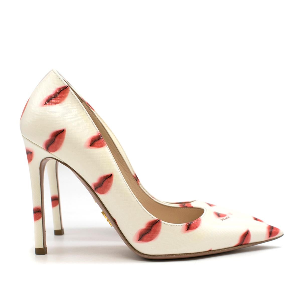 Prada White Lips-print Leather Pump

- White leather pump
- Slip on style
- Lips print
- 100 stiletto heel
- Pointed toe
- Nude leather lining with logo embroidered
- This item comes with the original dust bag and box

Please note, these items are