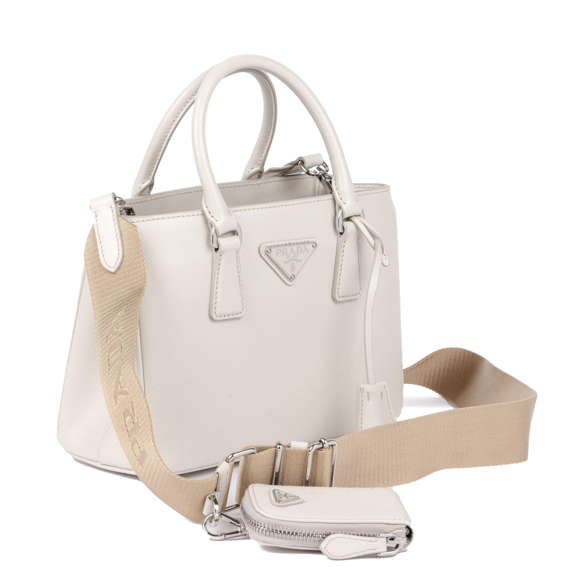 PRADA
White Saffiano Leather Mini Galleria Tote

Xupes Reference: CB840
Serial Number: 7/D
Age (Circa): 2021
Accompanied By: Prada Dust Bag, Authenticity Card, Care Booklet, Shoulder Strap, Clochette
Authenticity Details: Date Stamp (Made in