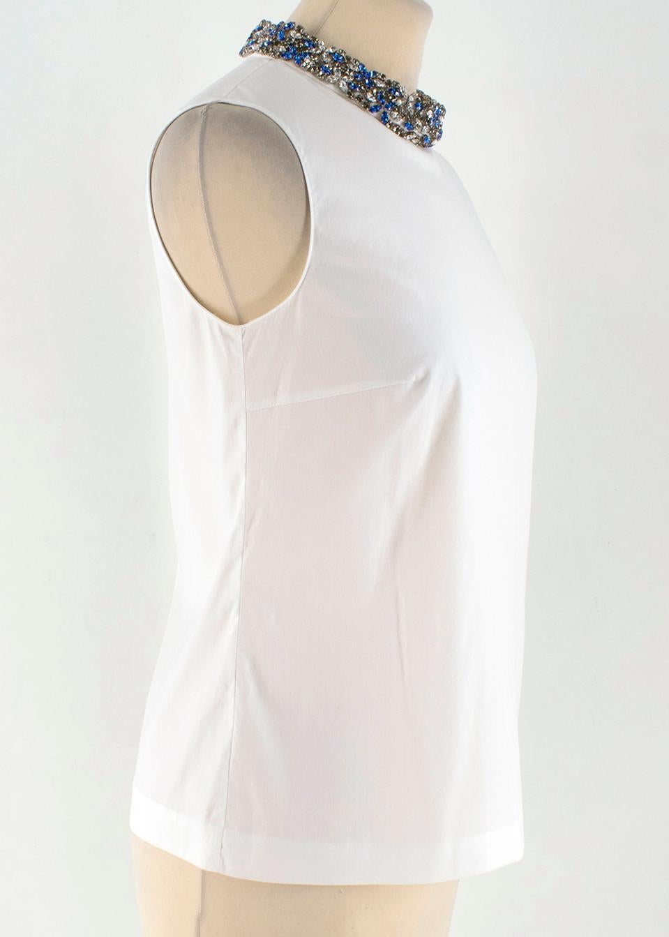 Prada White Sleeveless Top with Crystal Collar

- Hidden back zipper with hook
- Diamond collar 
- Made in Italy

Please note, these items are pre-owned and may show signs of being stored even when unworn and unused. This is reflected within the