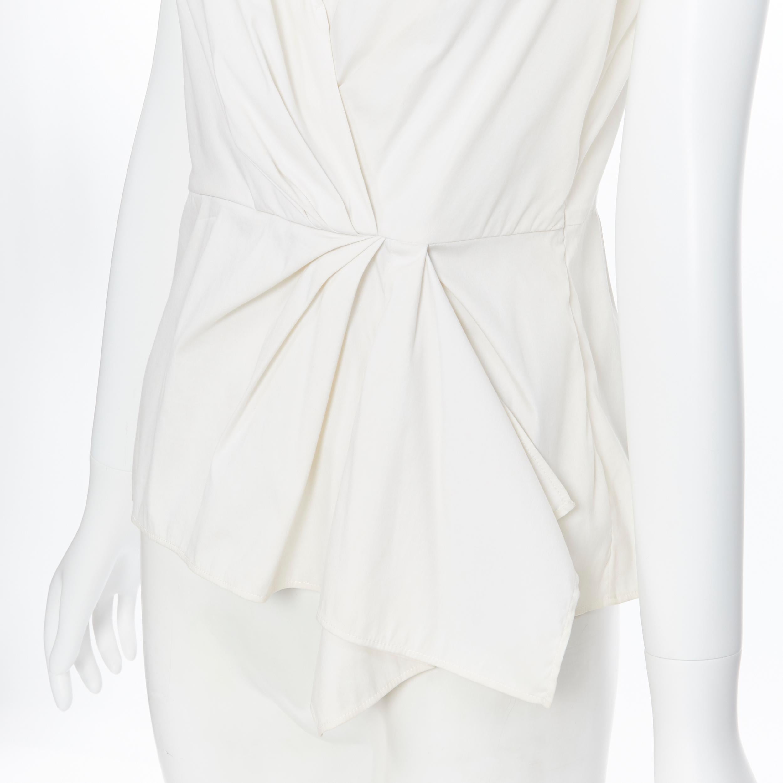 PRADA white stretch cotton draped pleated crossover sleeveless top IT42
Brand: Prada
Designer: Miuccia Prada
Model Name / Style: Draped top
Material: Cotton blend
Color: White
Pattern: Solid
Closure: Zip
Extra Detail: Draped pleated detailing.