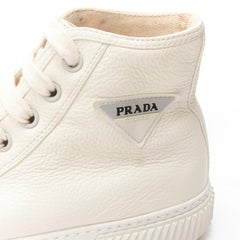 PRADA white textured leather black triangle logo high top sneakers UK7 EU40