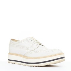 PRADA Wingtip white leather black beige platform brogue oxfords EU38