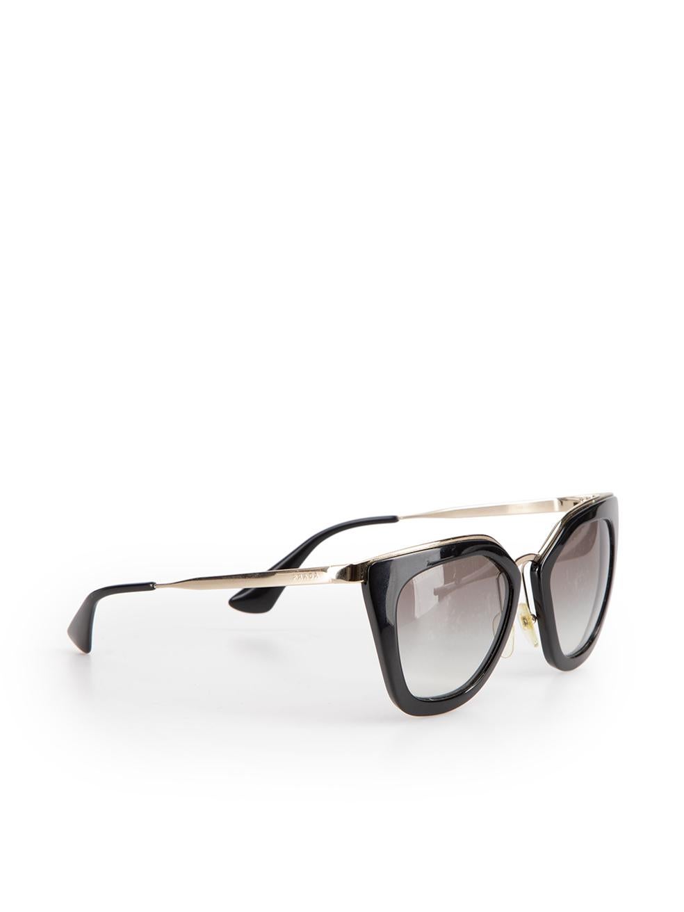 CONDITION is Very good. Minimal wear to sunglasses is evident. Minimal wear to the right arm with small scuff on this used Prada designer resale item. These sunglasses come in the original case and box.



Details


Black

Plastic

Oversized cat eye