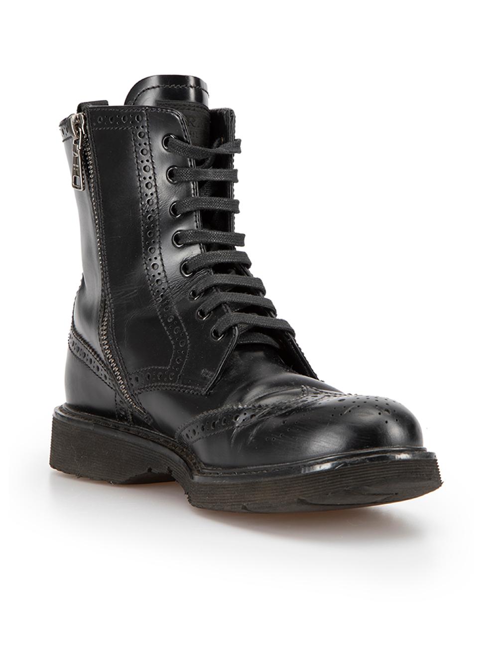 CONDITION is Good. General wear to boots is evident. Moderate signs of wear to the front of both boots with scuffs, both also have all-over creasing, right boot has unravelled stitching at the front side on this used Prada designer resale