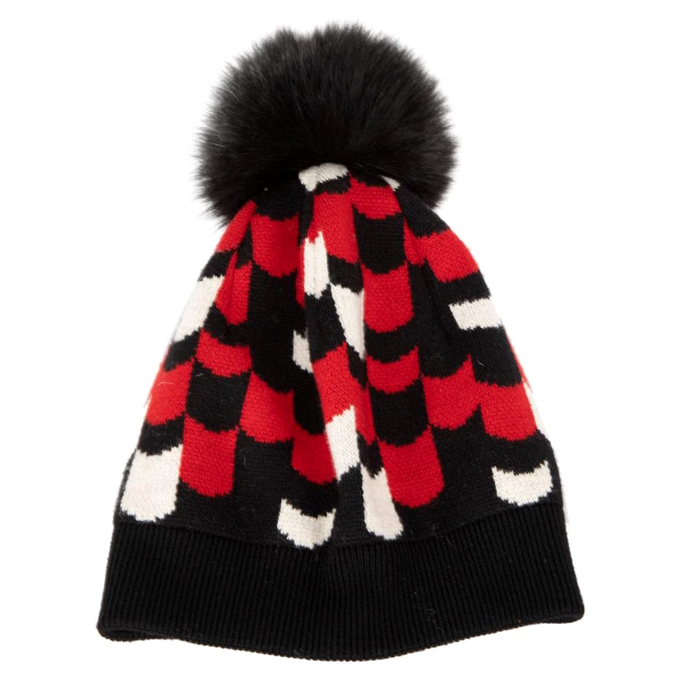 Bonnet à pompon en fourrure à motifs noirs et rouges pour femme Prada en vente