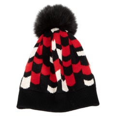 Bonnet à pompon en fourrure à motifs noirs et rouges pour femme Prada