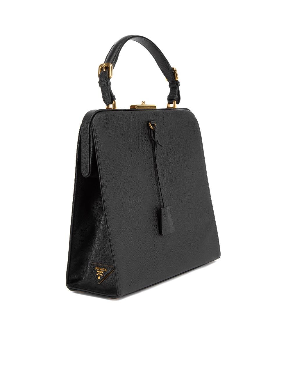 CONDITION is Never worn. No visible wear to bag is evident on this used Prada designer resale item. This item includes proof of authenticity and the original dustbag. Details Black Leather Large top handle frame bag 1x Top handle Gold tone hardware