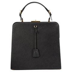 Prada Damen''s Schwarze Saffiano Lux Metallrahmen-Tasche