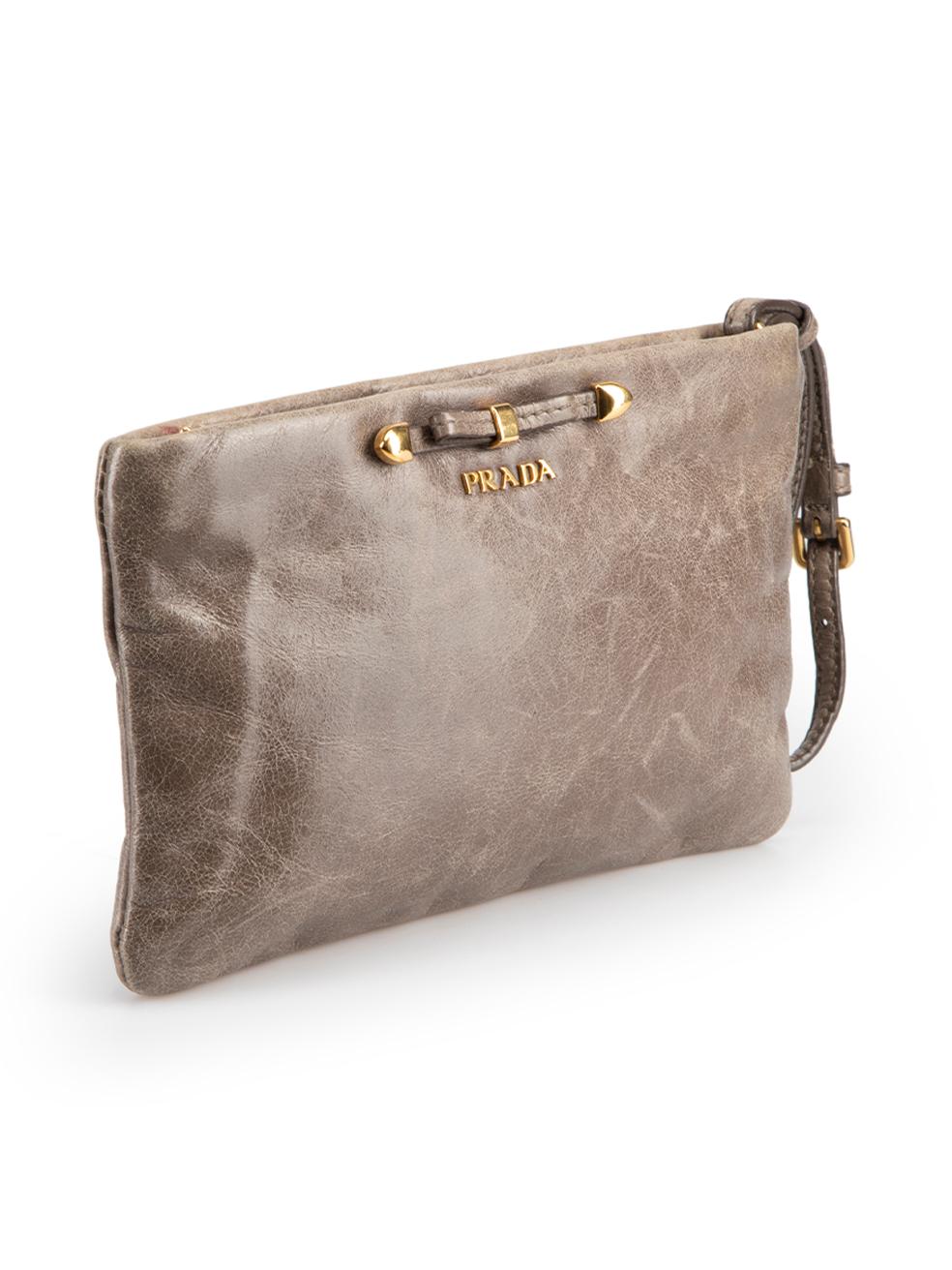 CONDITION is Very good. Minimal wear to clutch is evident. Minimal wear to the front and back with scuff marks on this used Prada designer resale item.



Details


Brown

Leather

Mini clutch

1x Zipped main compartment

Gold tone hardware

Gold
