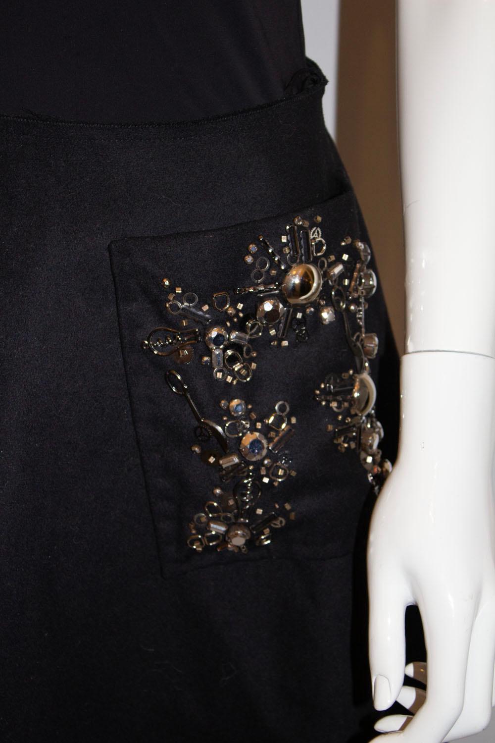 Prada, wonderful  embellished Black wool skirt For Sale 1