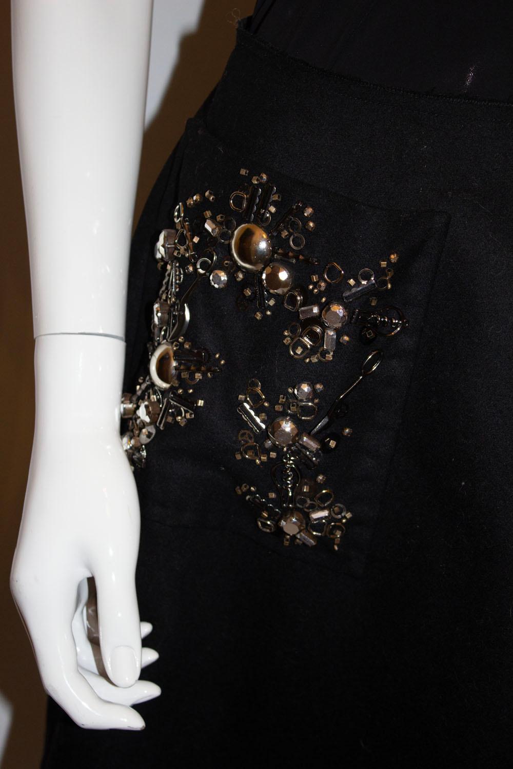 Prada, wonderful  embellished Black wool skirt For Sale 2