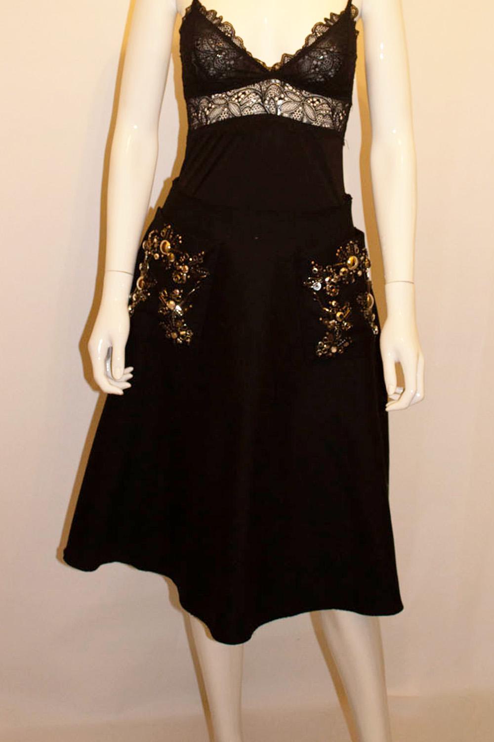 Prada, wonderful  embellished Black wool skirt For Sale 4