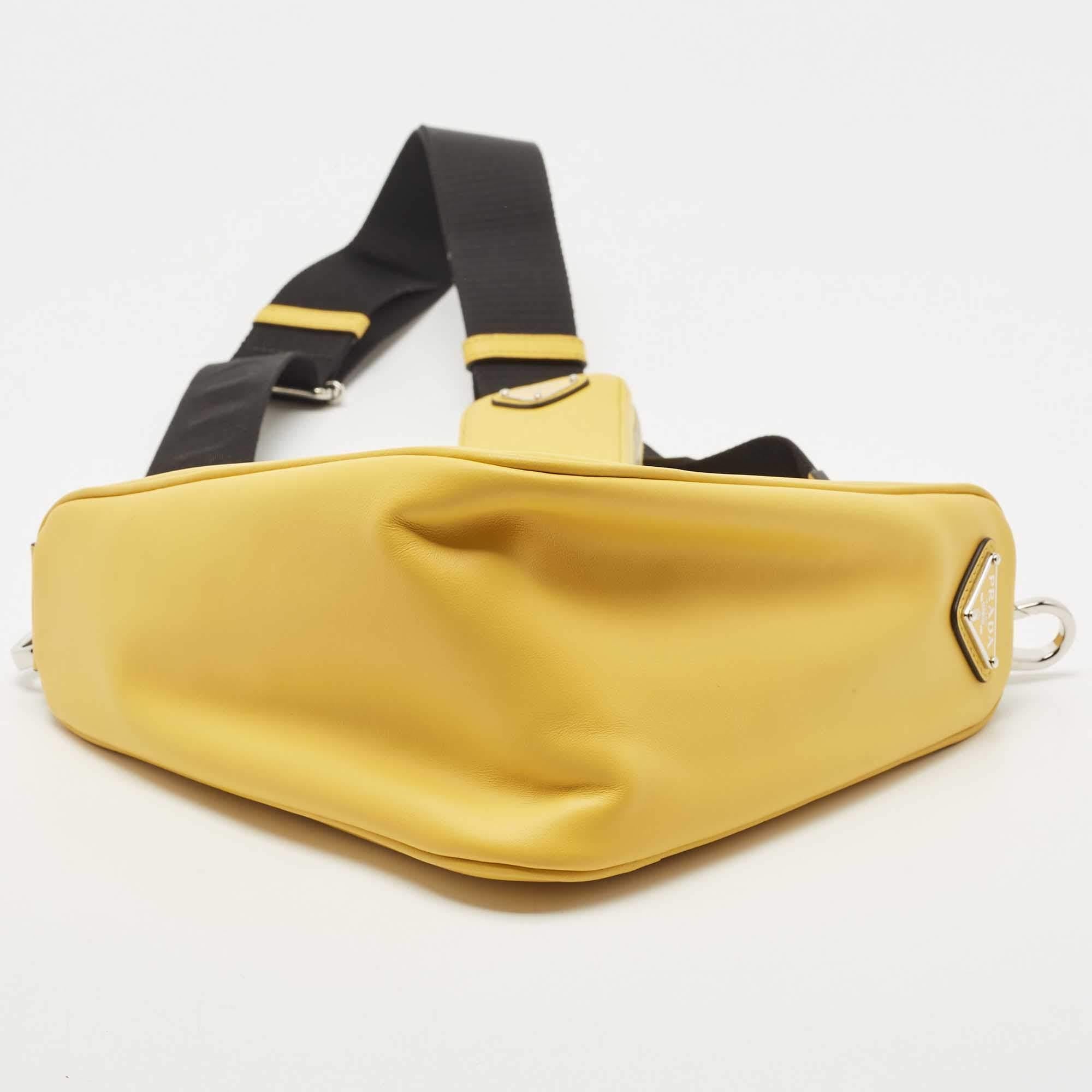 gold prada triangle bag