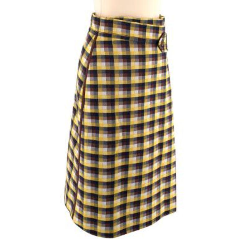 Prada Yellow & Brown Plaid Wrap Midi Skirt

- Yellow, brown, and navy plaid print
- Button and velcro clasp
- Rubber floral design on velcro
- Rubber prada logo on slit in skirt
- Matching jacket available in separate HEWI listing

Material:
100%
