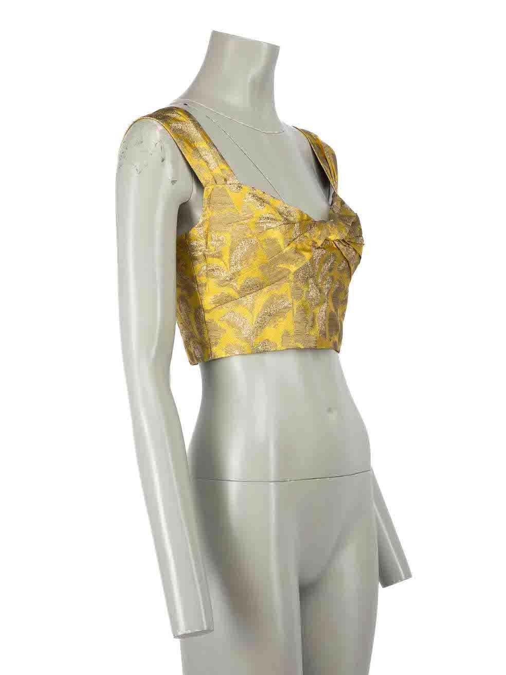 CONDITION is Very good. Hardly any visible wear to top is evident on this used Prada designer resale item.
 
 Details
 Yellow
 Synthetic
 Top
 Metallic thread
 Cropped
 Jacquard floral pattern
 Sleeveless
 Front bow detail
 Back zip fastening
 
 
