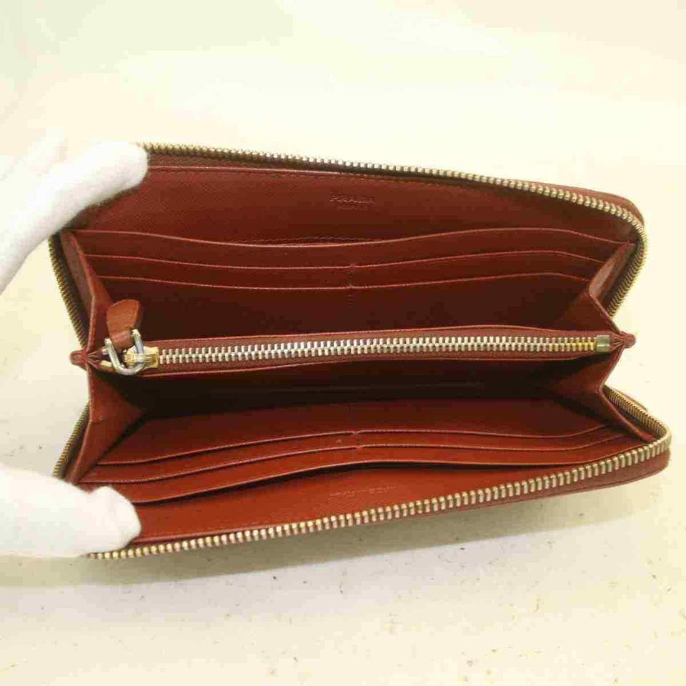 Prada Zippy Wallet Browns Leather 860339 In Good Condition For Sale In Dix hills, NY