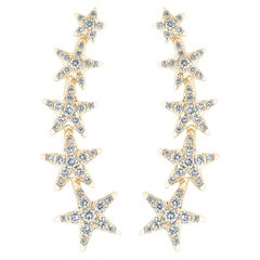 Boucles d'oreilles « Irama Stars » de Pradera en or 18 carats, serties de diamants totalisant 0,61 carat