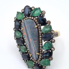 Pradera Jewell Anello in oro e argento 18K con diamanti, smeraldi, opale e zaffiro