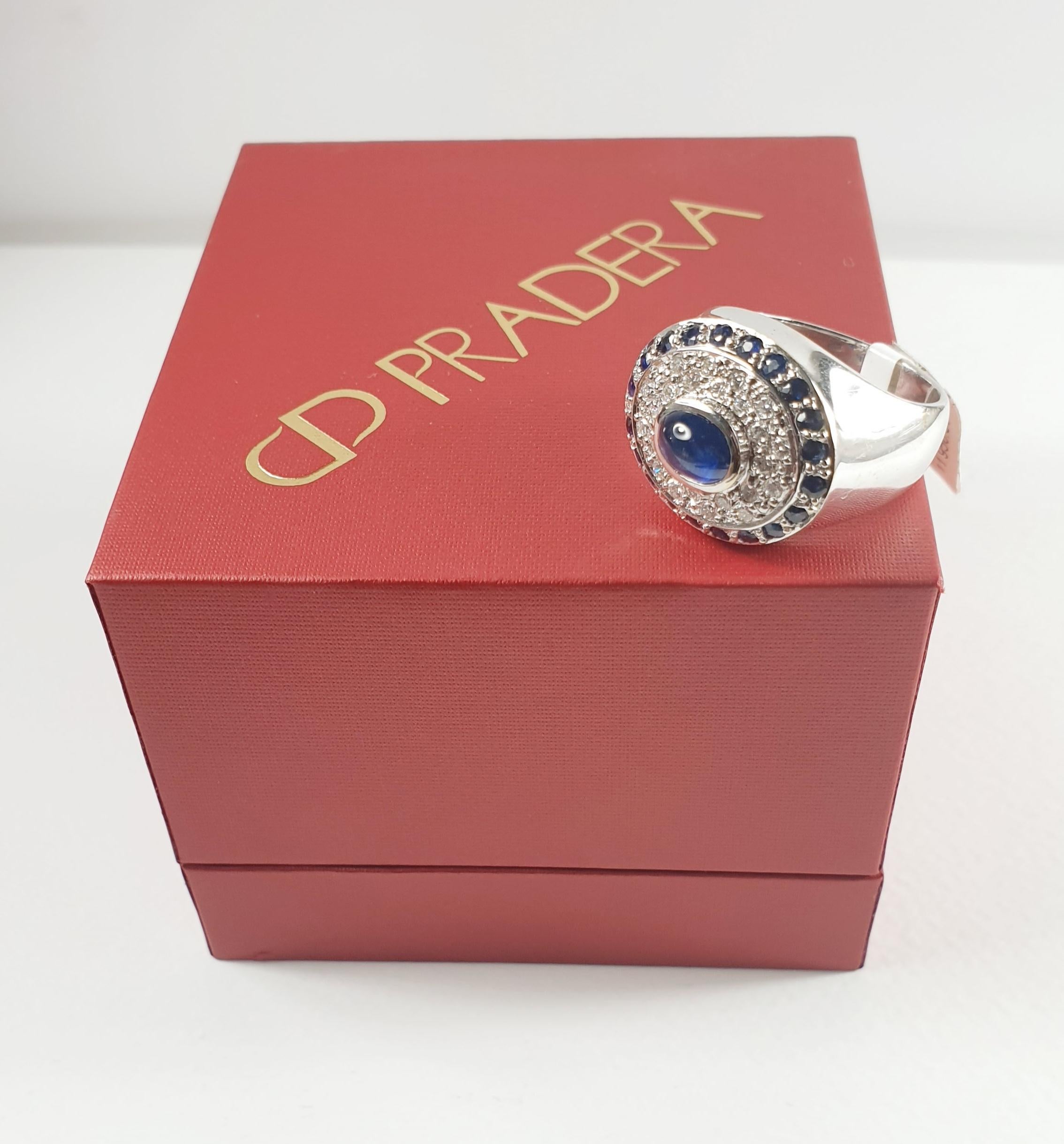 Women's Pradera Ring with a Central Sapphire and Little Sapphires and Diamonds For Sale