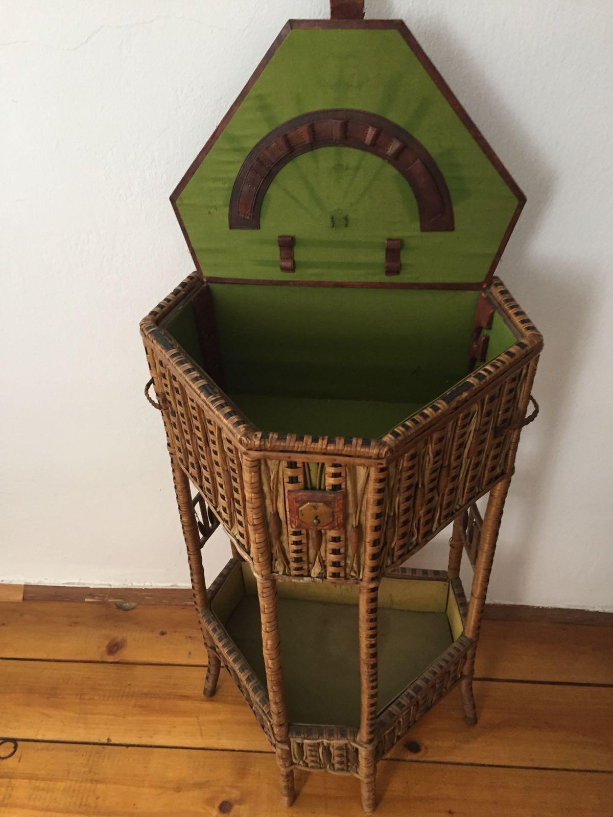 This is a very special and rare piece: 
This sewing table is from turn of the century. Prag Rudniker was a famous wicker manufacturer, originally from Vienna, Austria, Prag Czechoslovakia and Bukarest, Rumania. One of its students was the famous