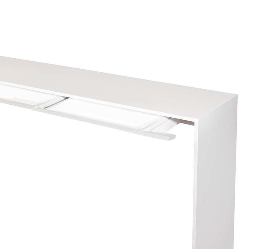 Console with an elegant and innovative design, an essential addition to any modern homes. The structure feratures slender lines and sides shaped on the inside and has a 45° connection between the top and the side. The undershelf has two hidden