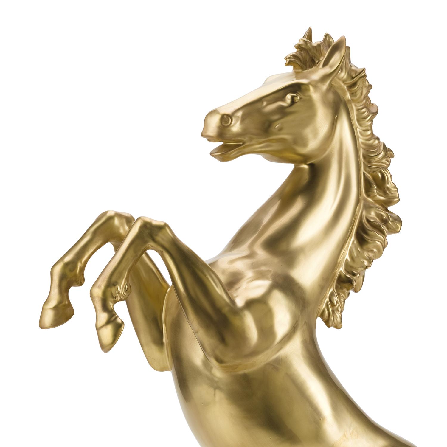 Sculpture prancing stallion all made
in porcelain and gold-plated in 24-karat.