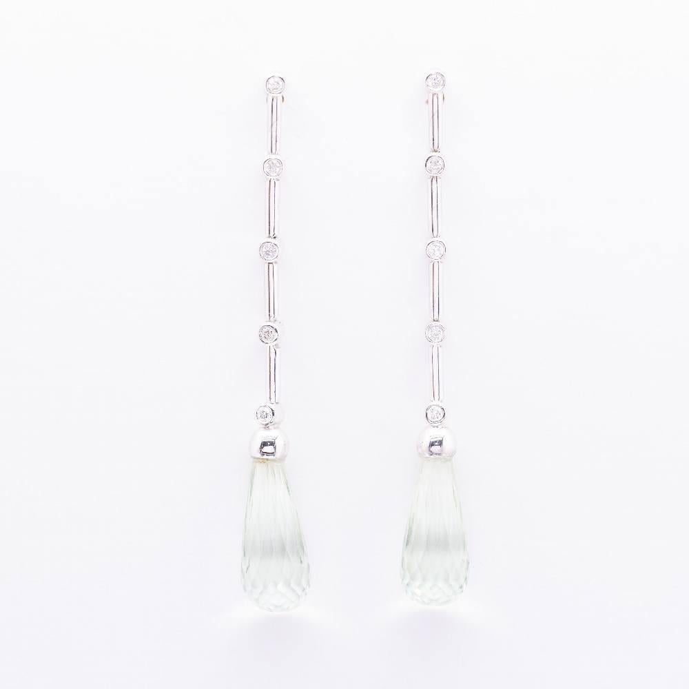 Earrings in white gold for woman : 10x Brilliant cut diamonds with a total weight of 0,23 cts., quality G/Vs and 2x briolé Prasiolites (commonly known as green Agate) of 14x21mm  Pressure closing  18 kt. white gold  9,60 grams.  Measures: 6 cm long 