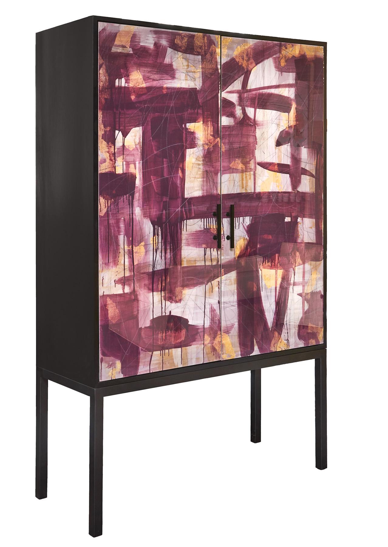 The Pratt Armoire is designed and finished by hand in our Toronto studio, Morgan Clayhall.

The abstract artwork has a contained fluidity in the layout. The  colours used in the artwork are all in the same family that compliment each layer.  This