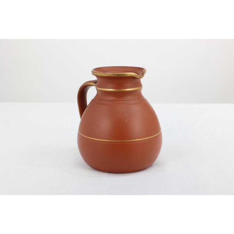 Terracotta Prattware. A Gothic Revival terracotta jug with gilded line decoration.  For Sale