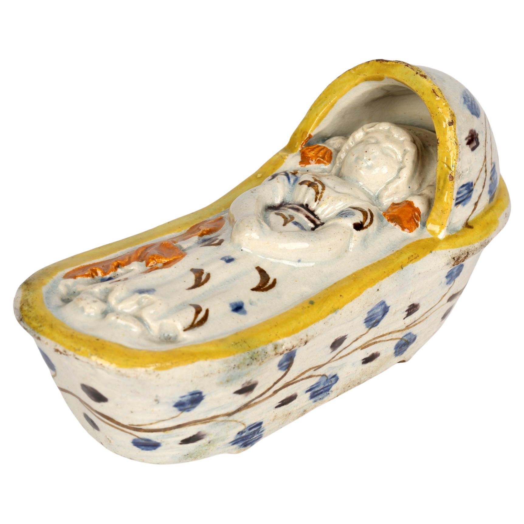 Prattware English Pottery Cradle with a Sleeping Child For Sale